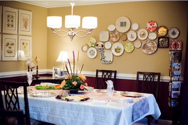 Plates displayed in a dining room Plates displayed in a dining room