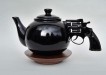 Pistol handled teapot