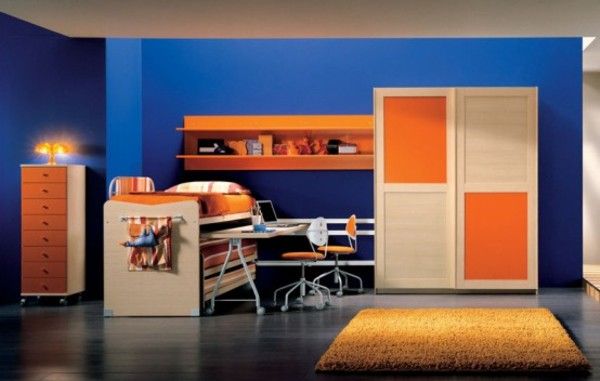 dark-blue-wall-paint-and-dark-orange-interior-for-teen-bedroom